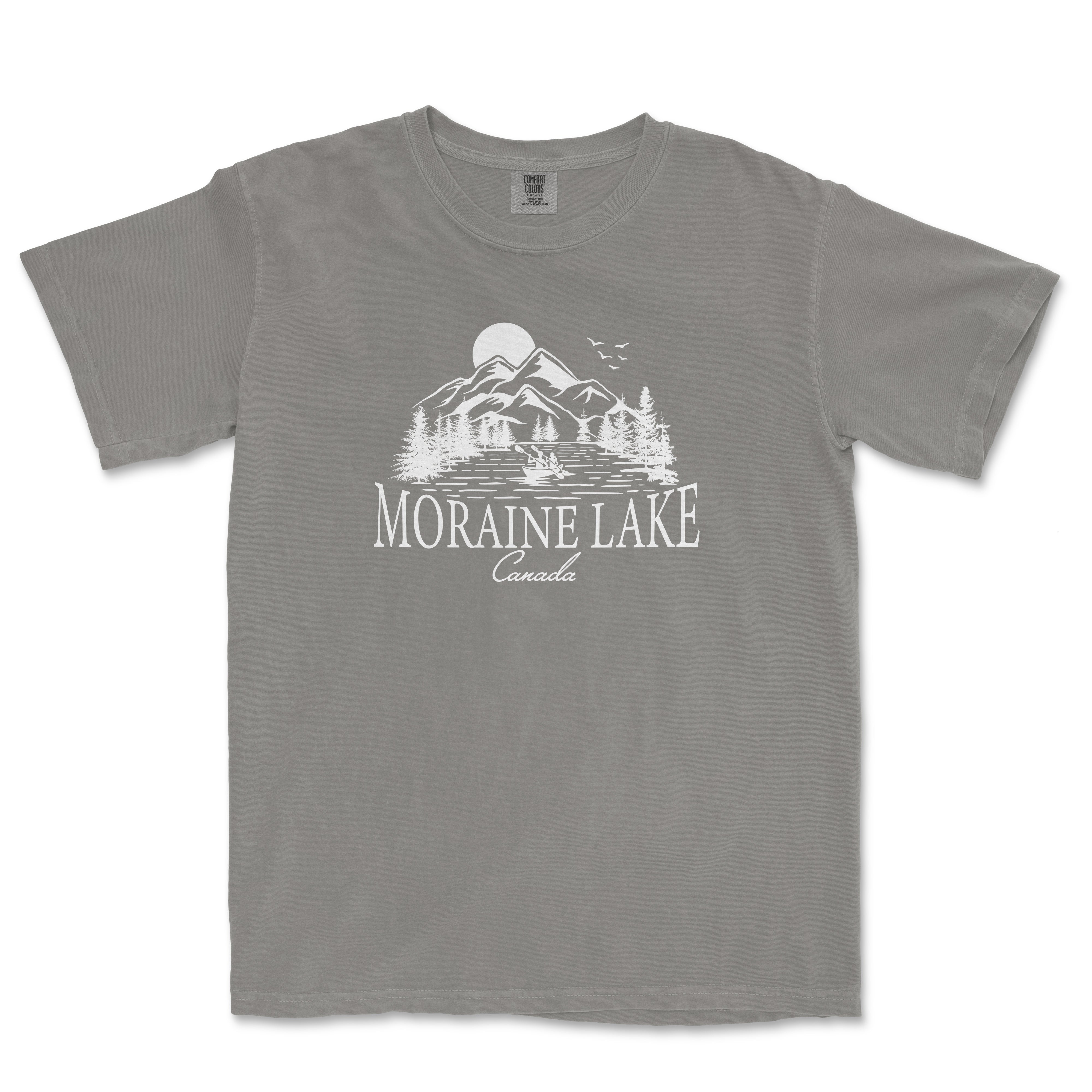 a gray t - shirt with a mountain lake on it