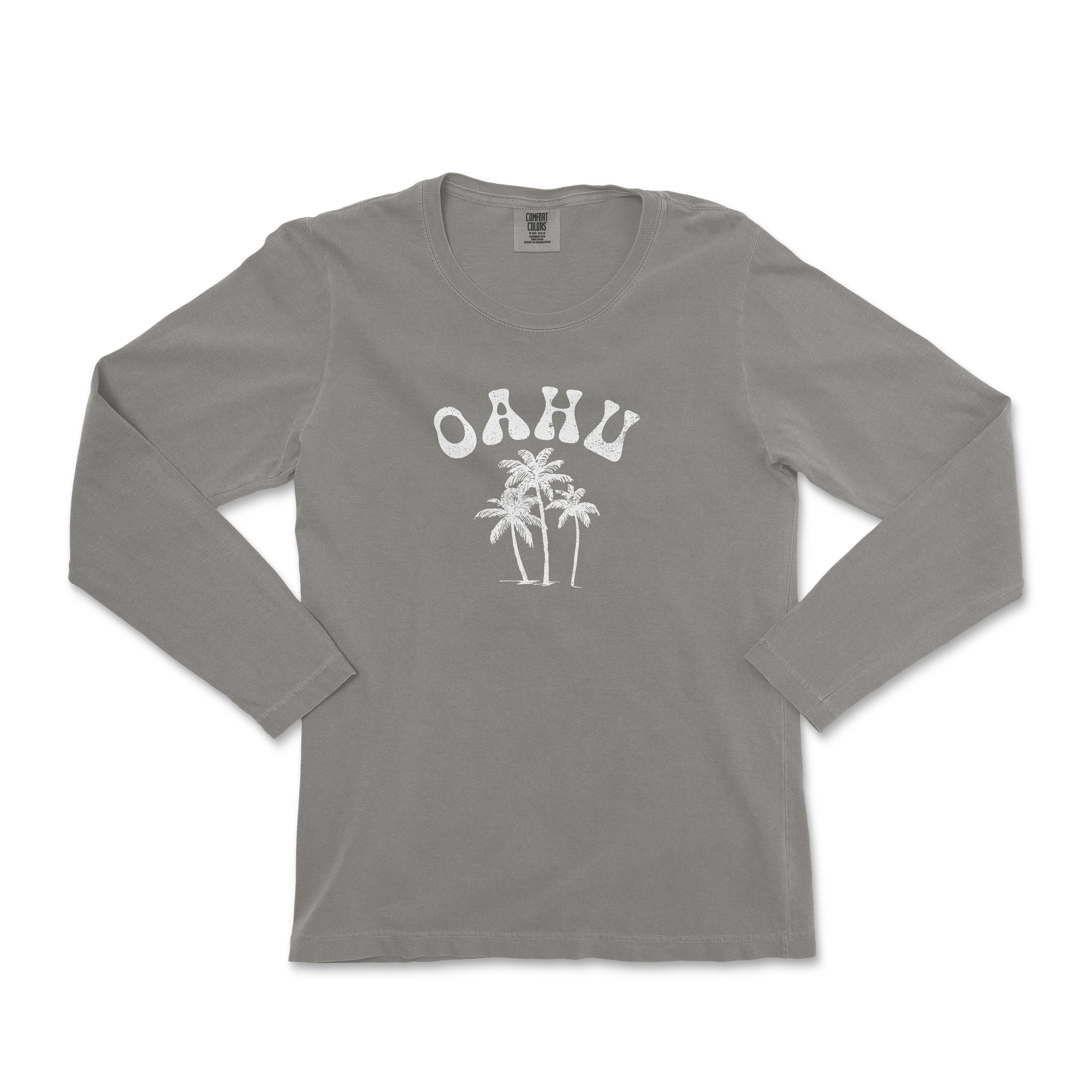 a women's long sleeve shirt with a palm tree on it