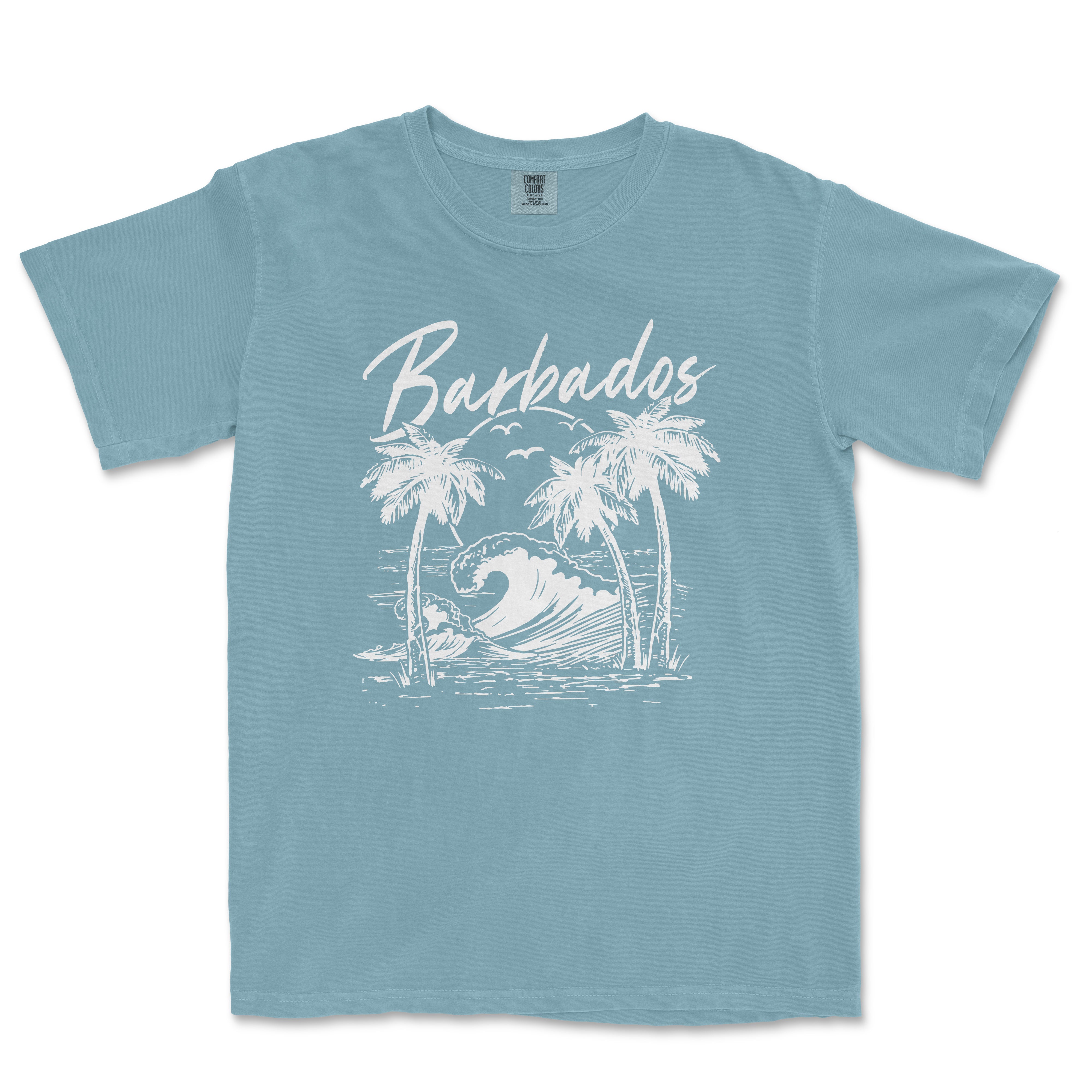 a blue t - shirt with a picture of a surfboarder riding a wave