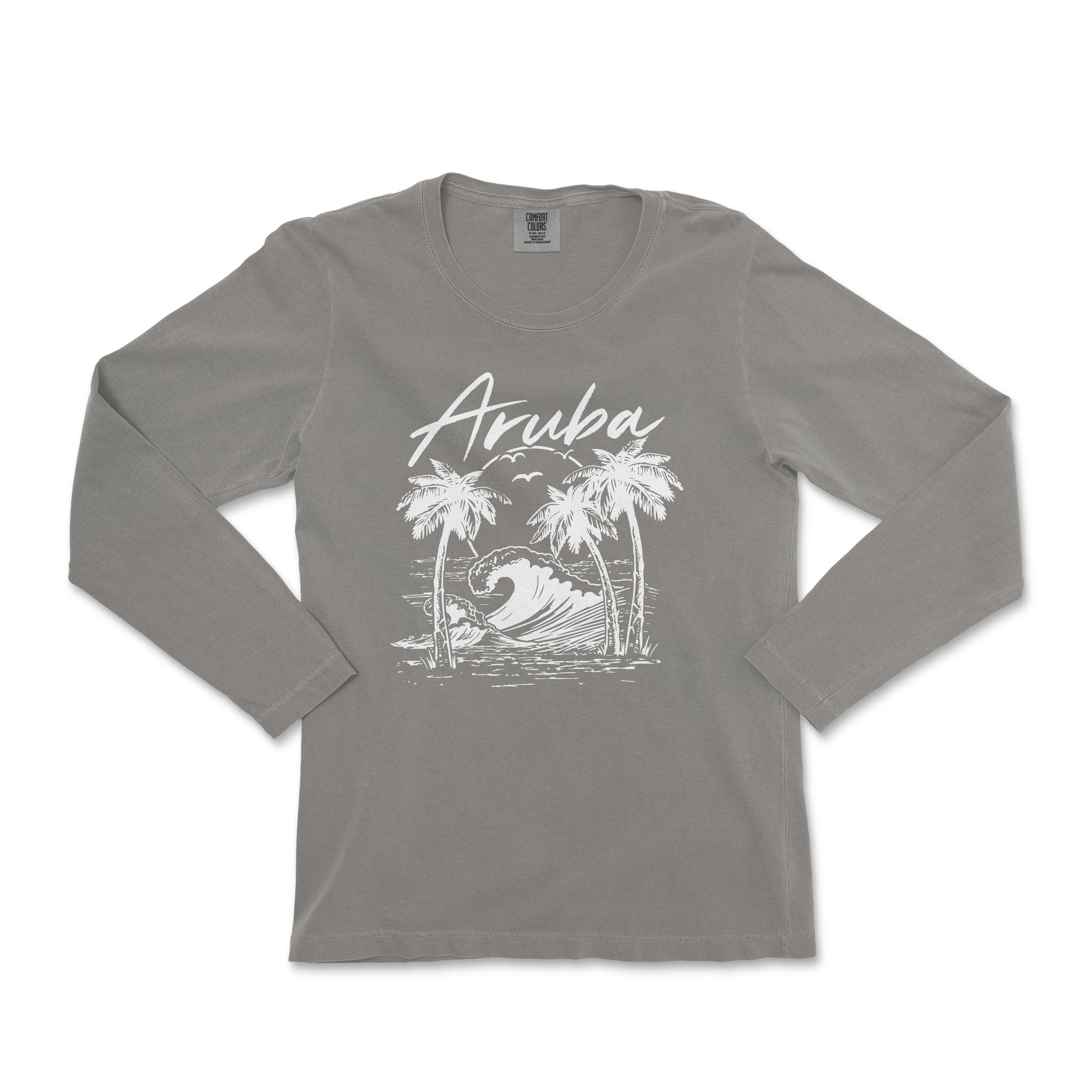 a women's long sleeve shirt with an image of a surfer on a wave