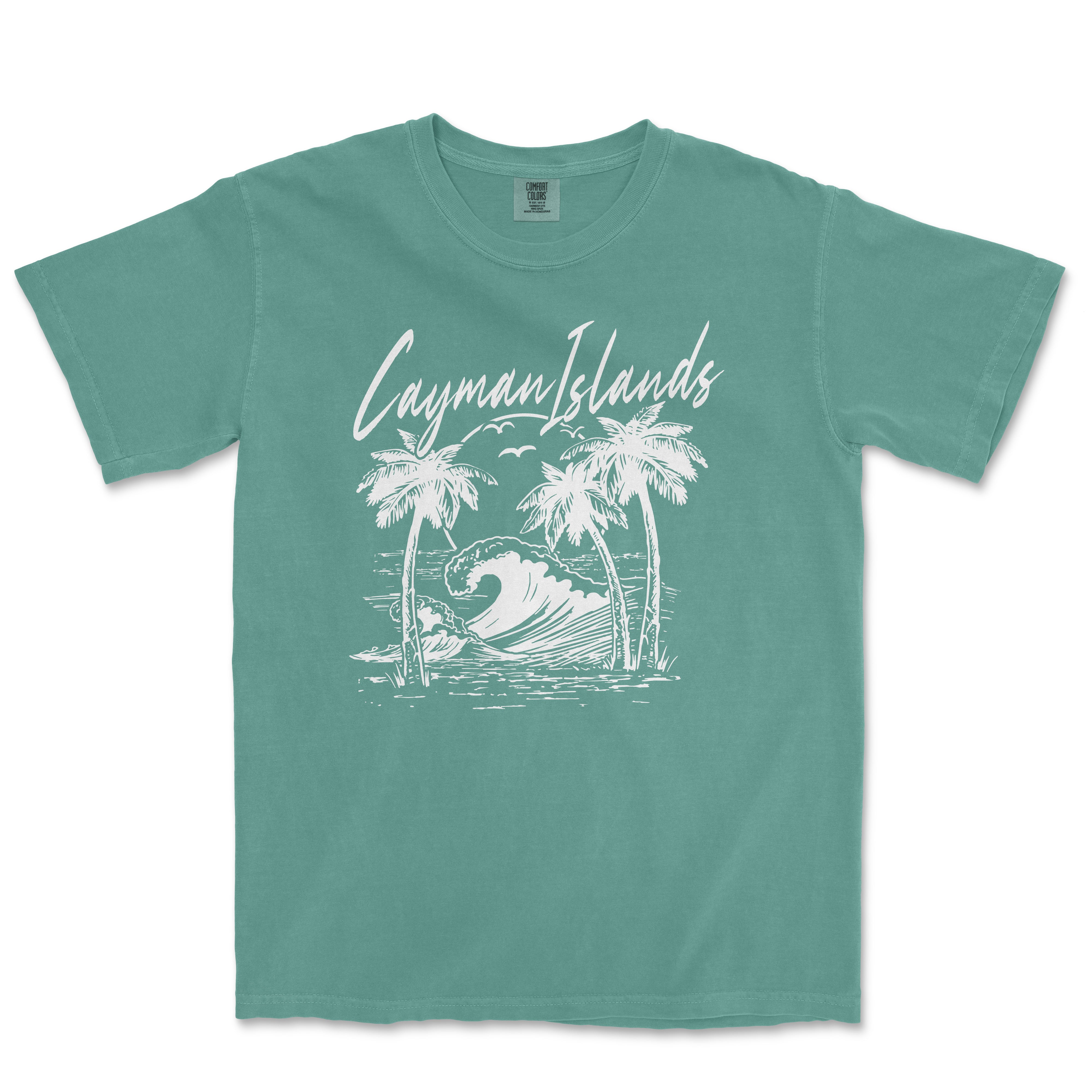 a green t - shirt with a picture of a surfboarder riding a wave