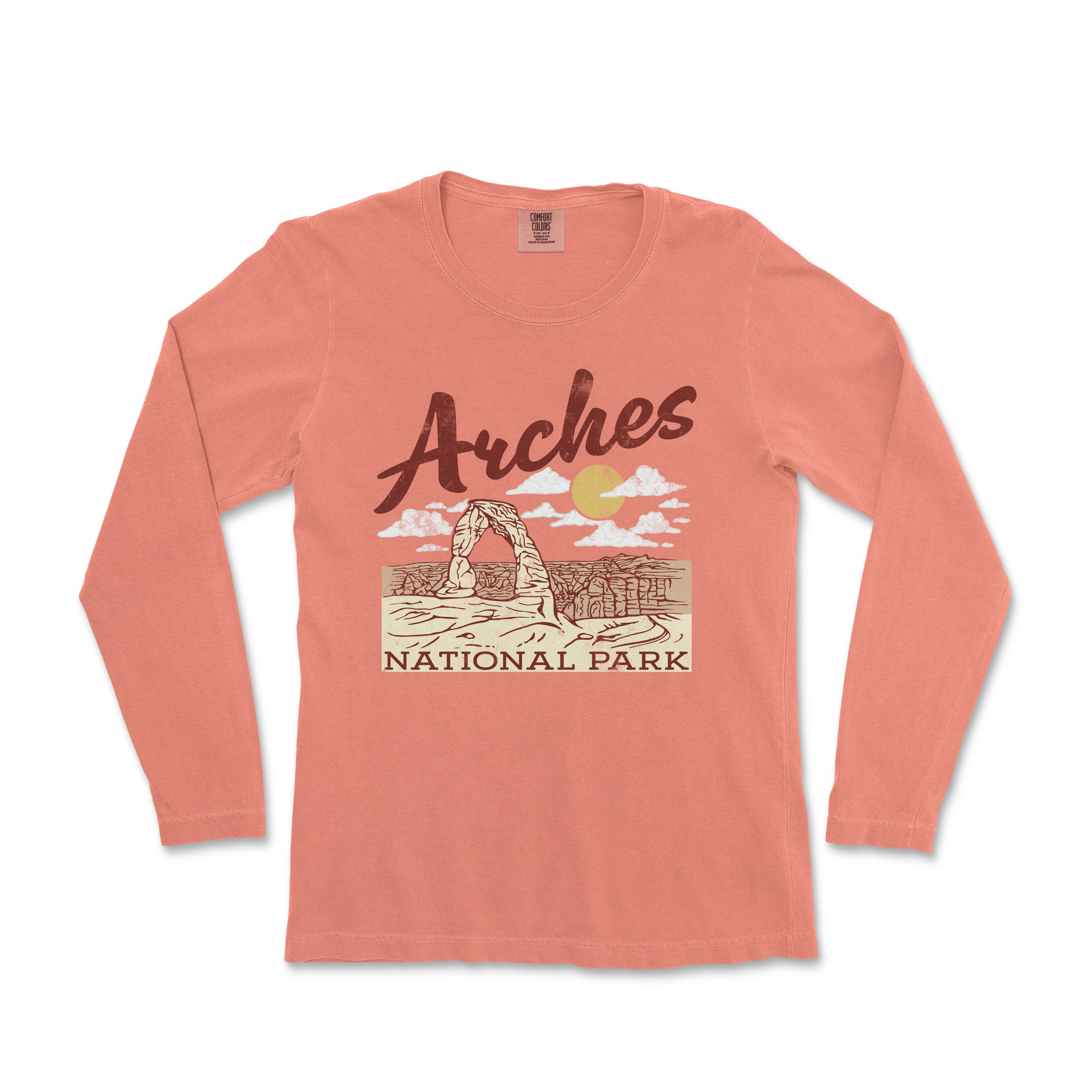 a women's long sleeve shirt with the words arches on it