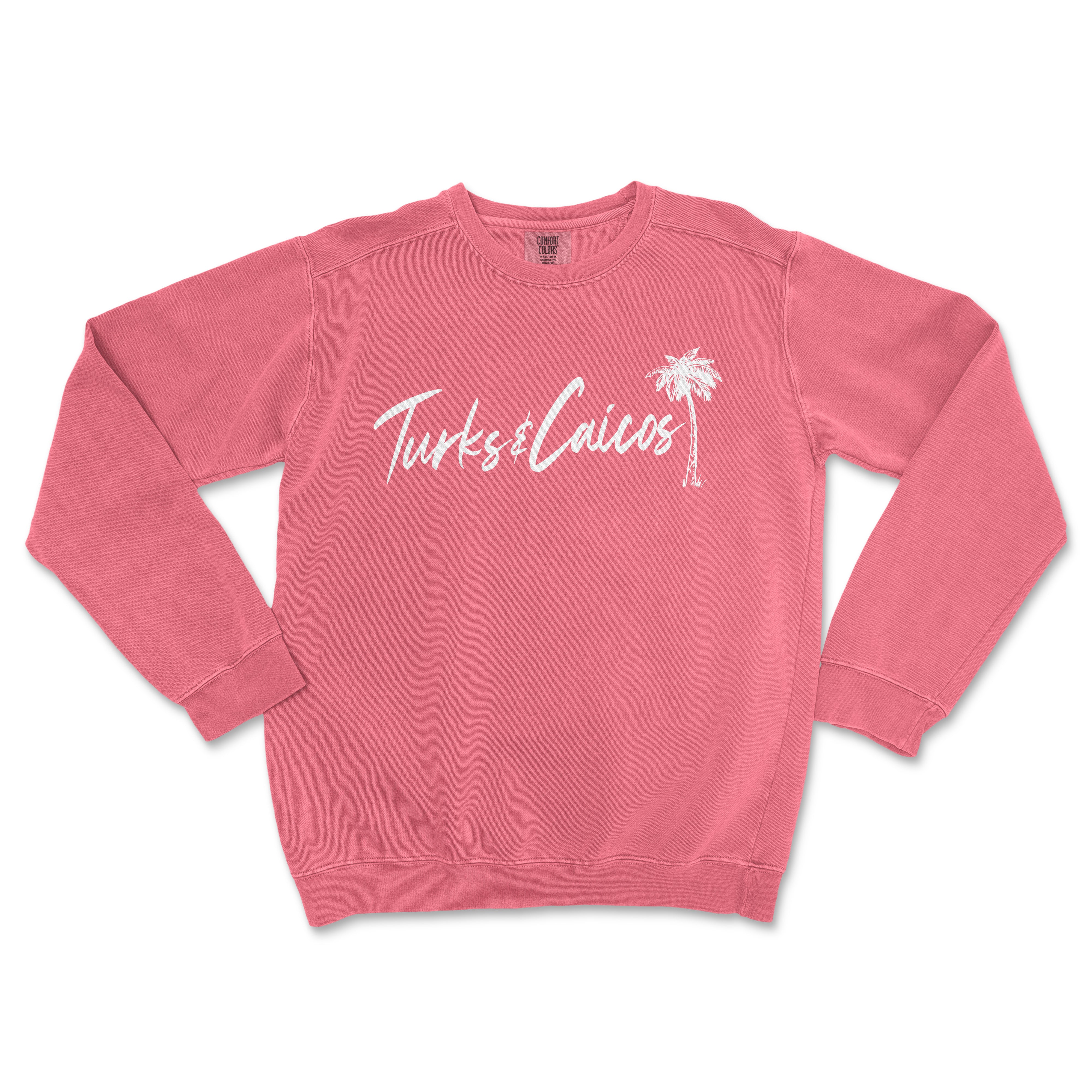 a pink sweatshirt with a palm tree on it