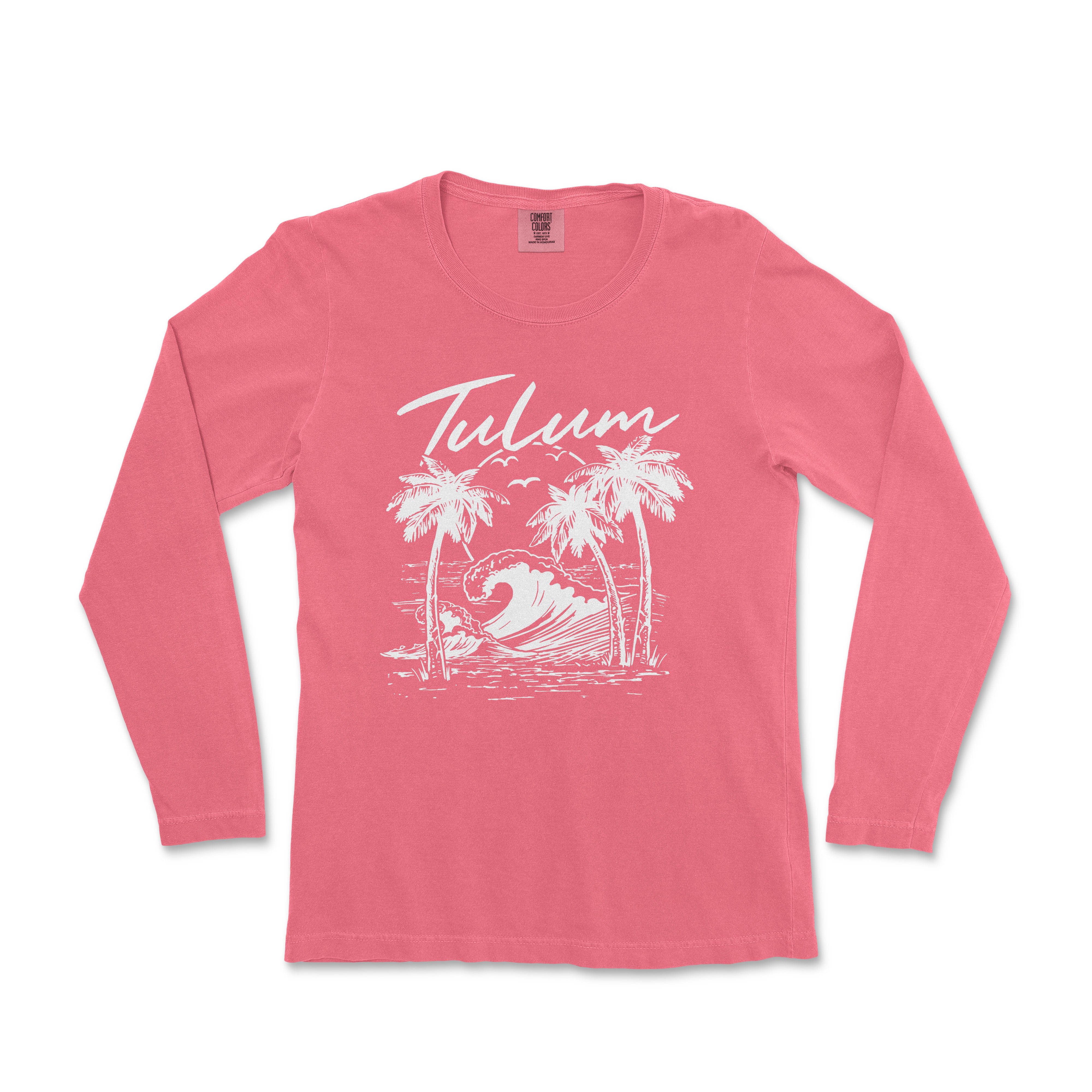 a women's long sleeve shirt with a palm tree and a surfboard on