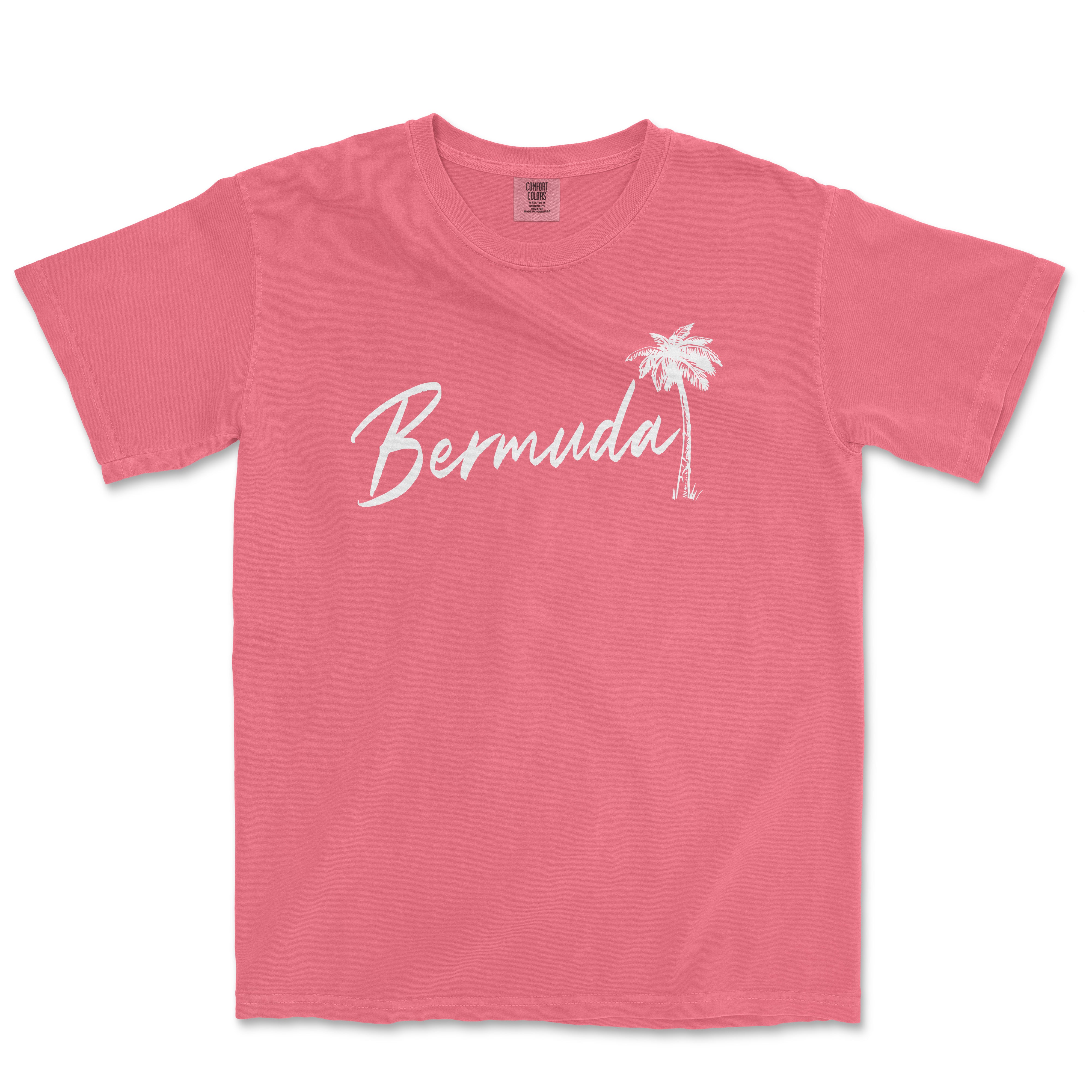 a pink t - shirt with a palm tree and the word bernda in white