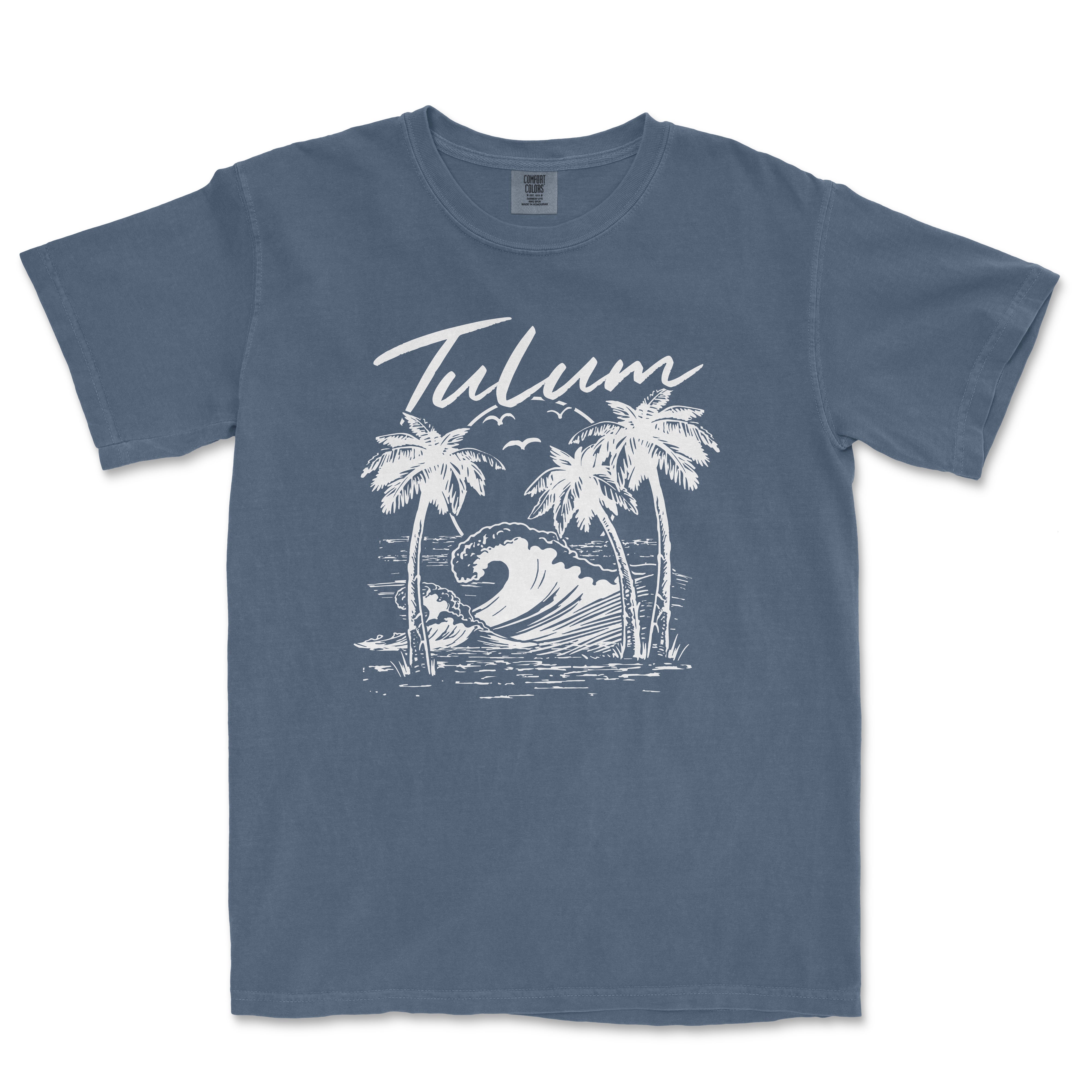 a blue t - shirt with a picture of a wave and palm trees