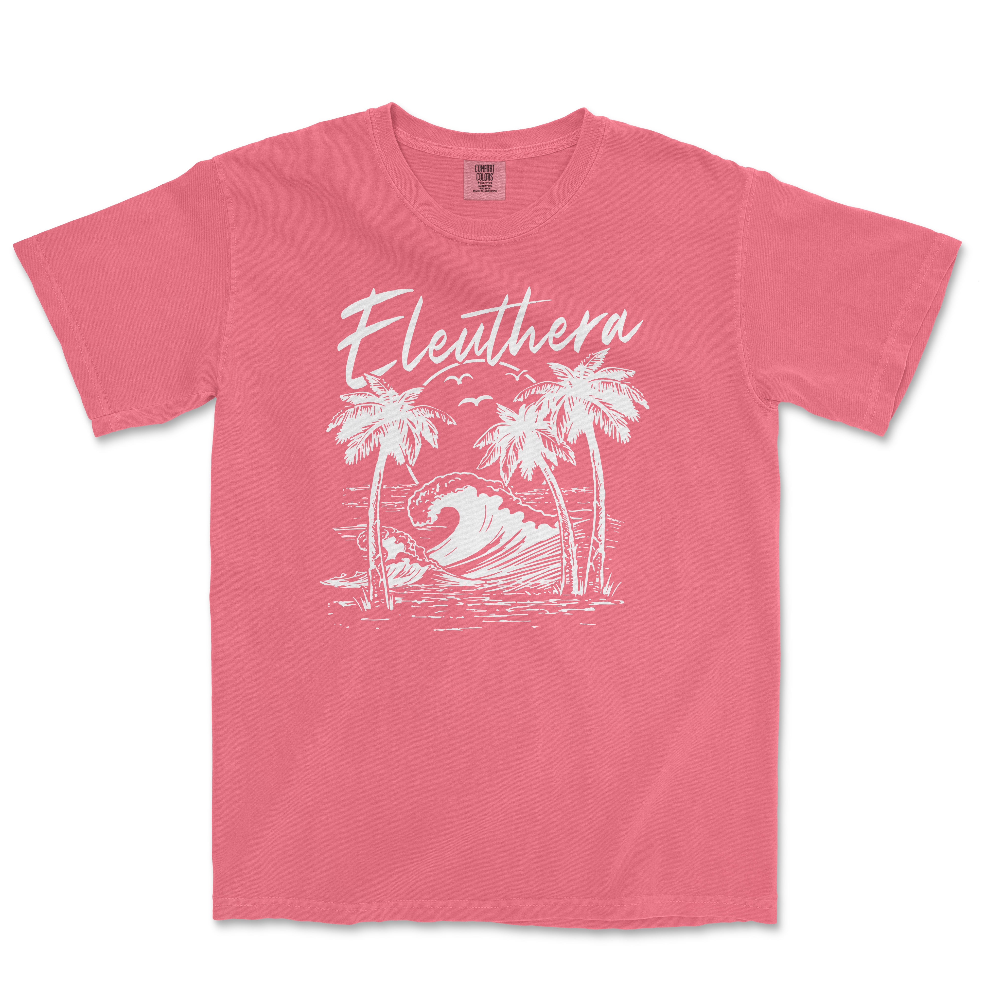 a pink t - shirt with a picture of a wave and palm trees