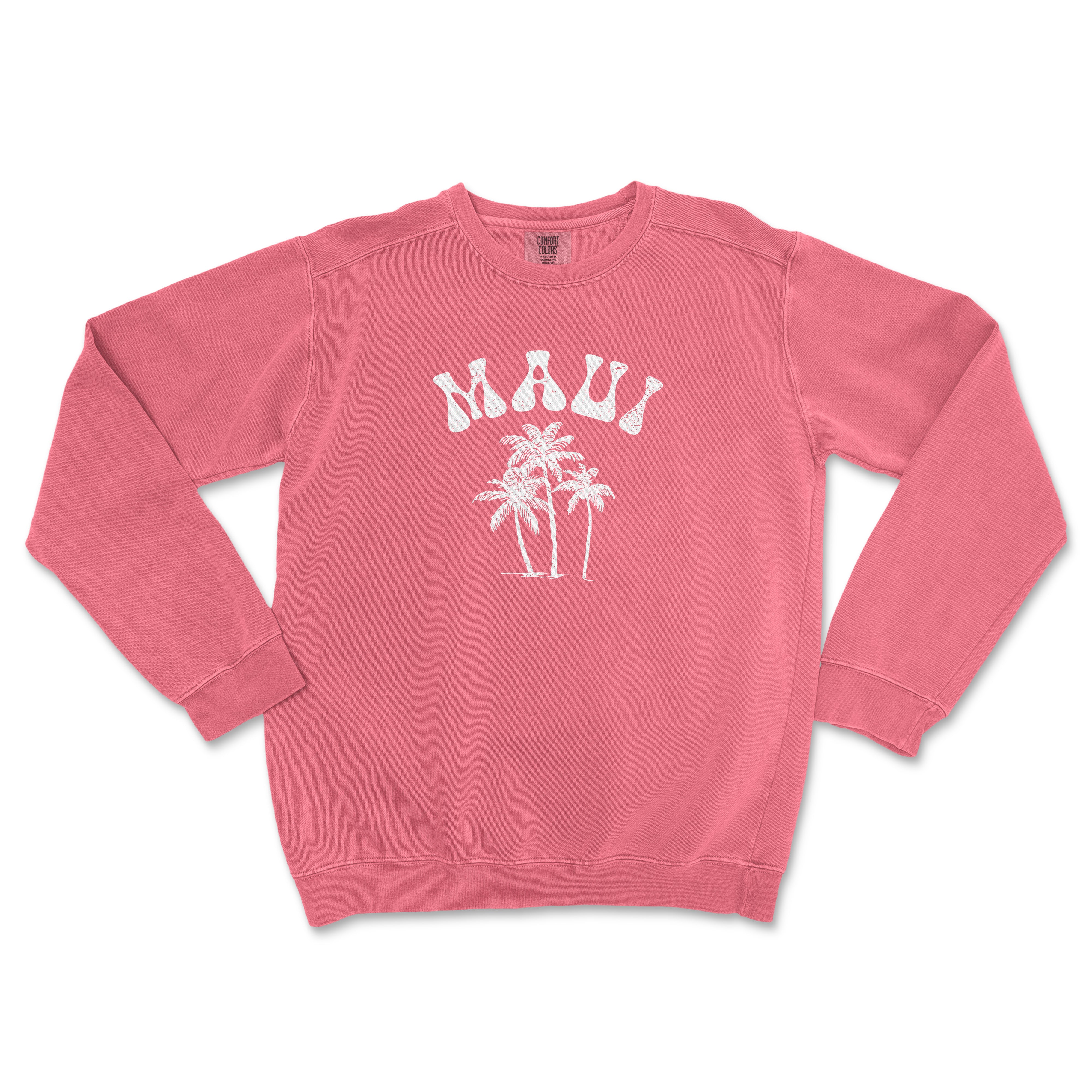 a pink sweatshirt with palm trees printed on it