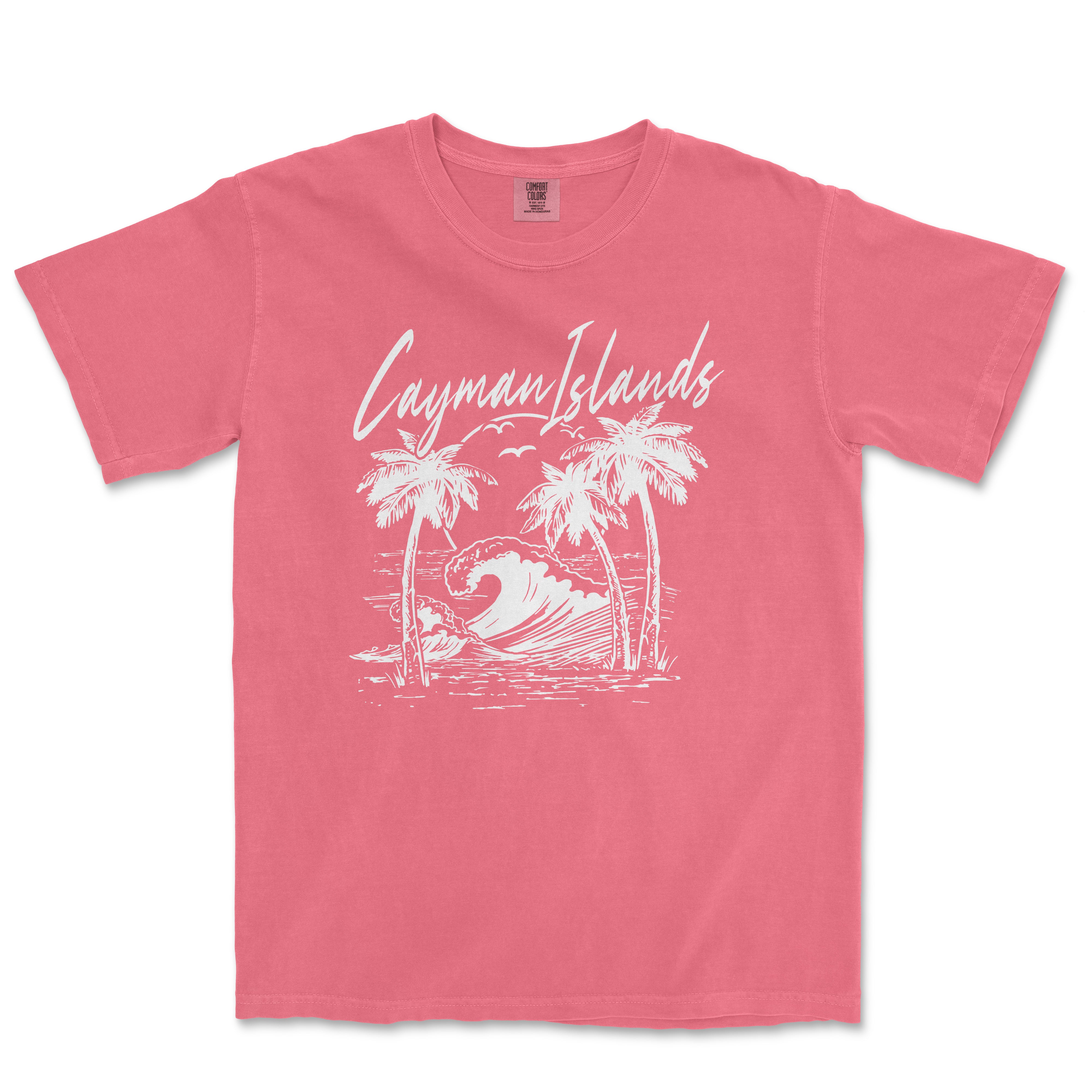 a pink t - shirt with a picture of a surfboarder riding a wave