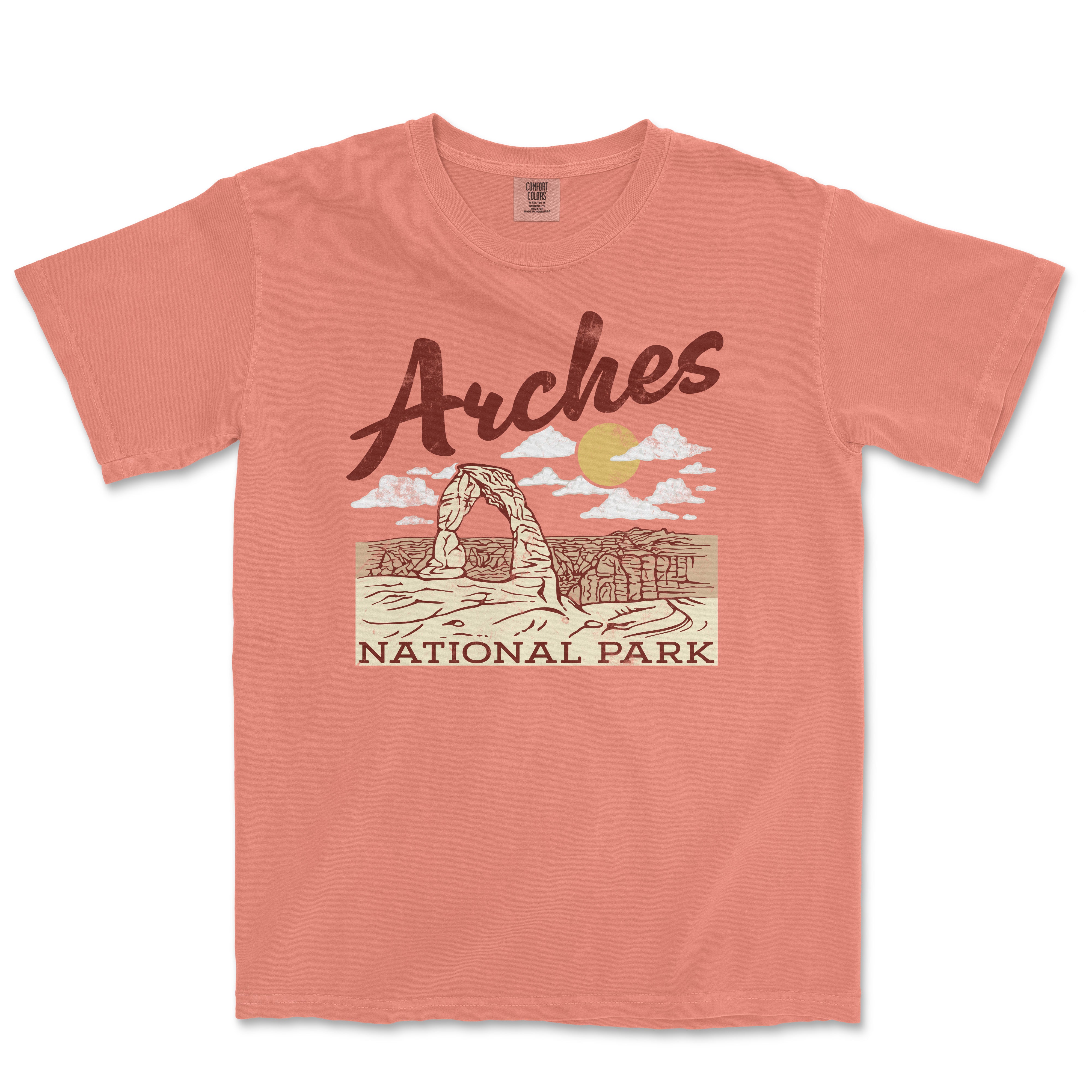 an orange t - shirt with arches national park on it