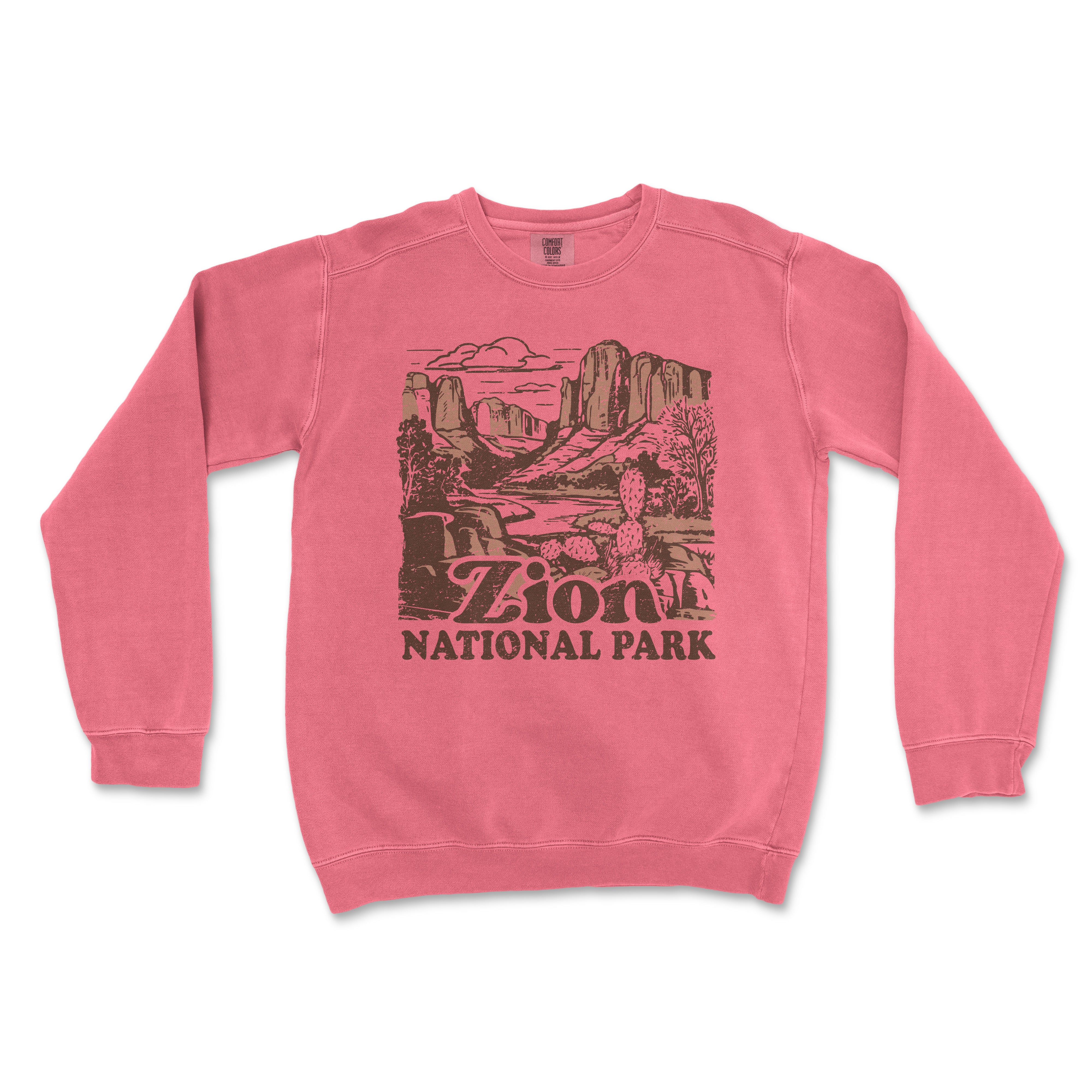 a pink sweater with a picture of a canyon