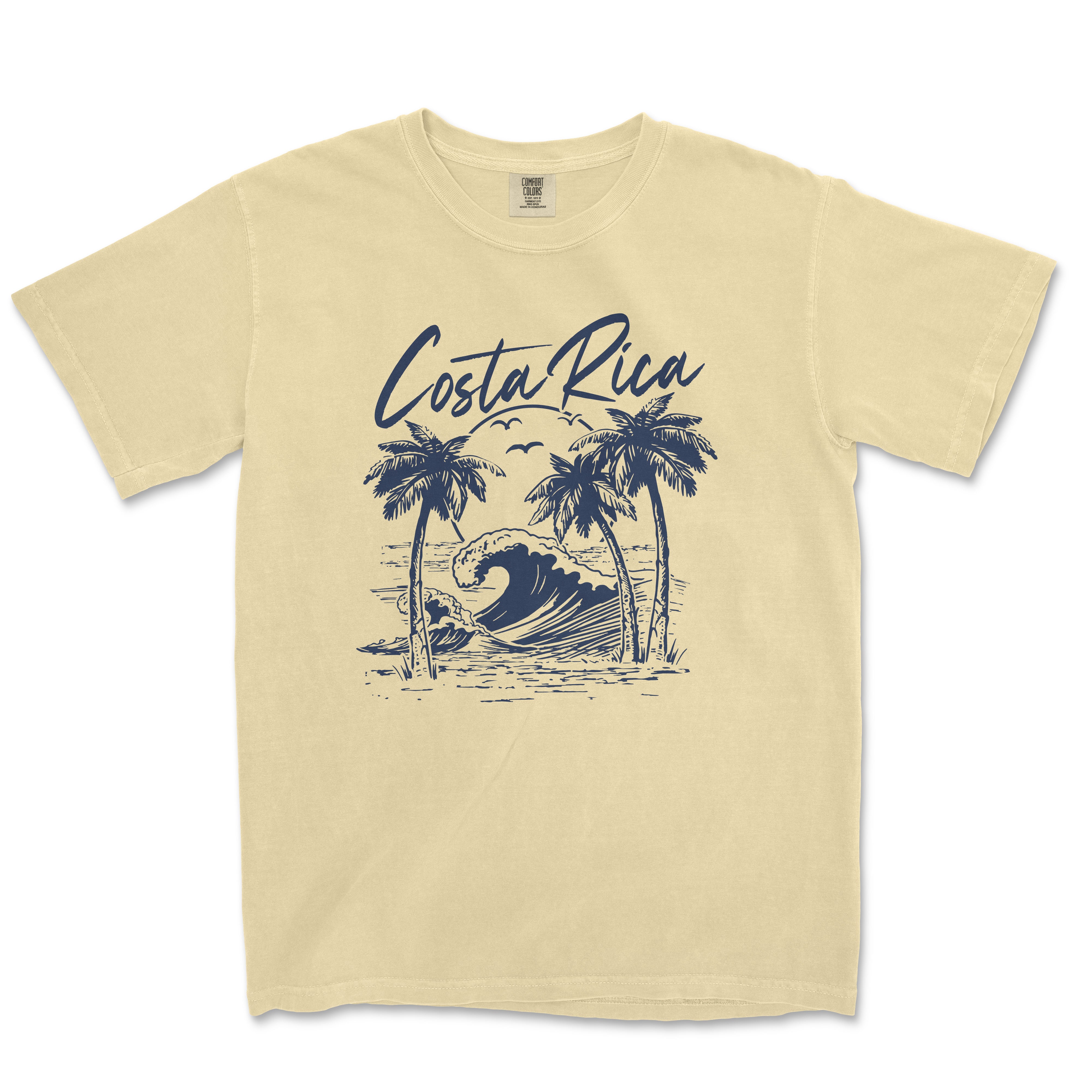 a yellow t - shirt with a picture of a wave and palm trees