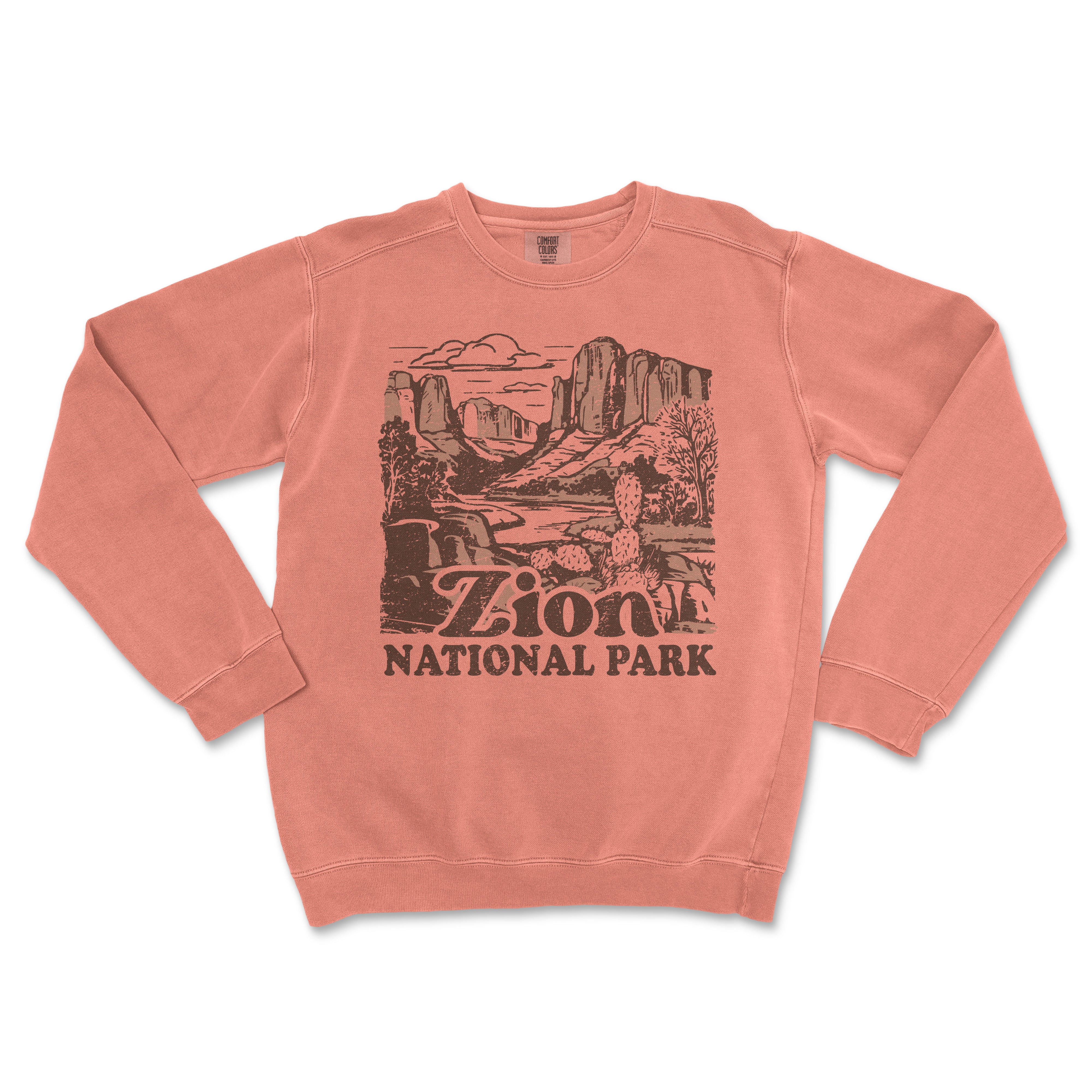 a pink sweatshirt with a picture of a mountain