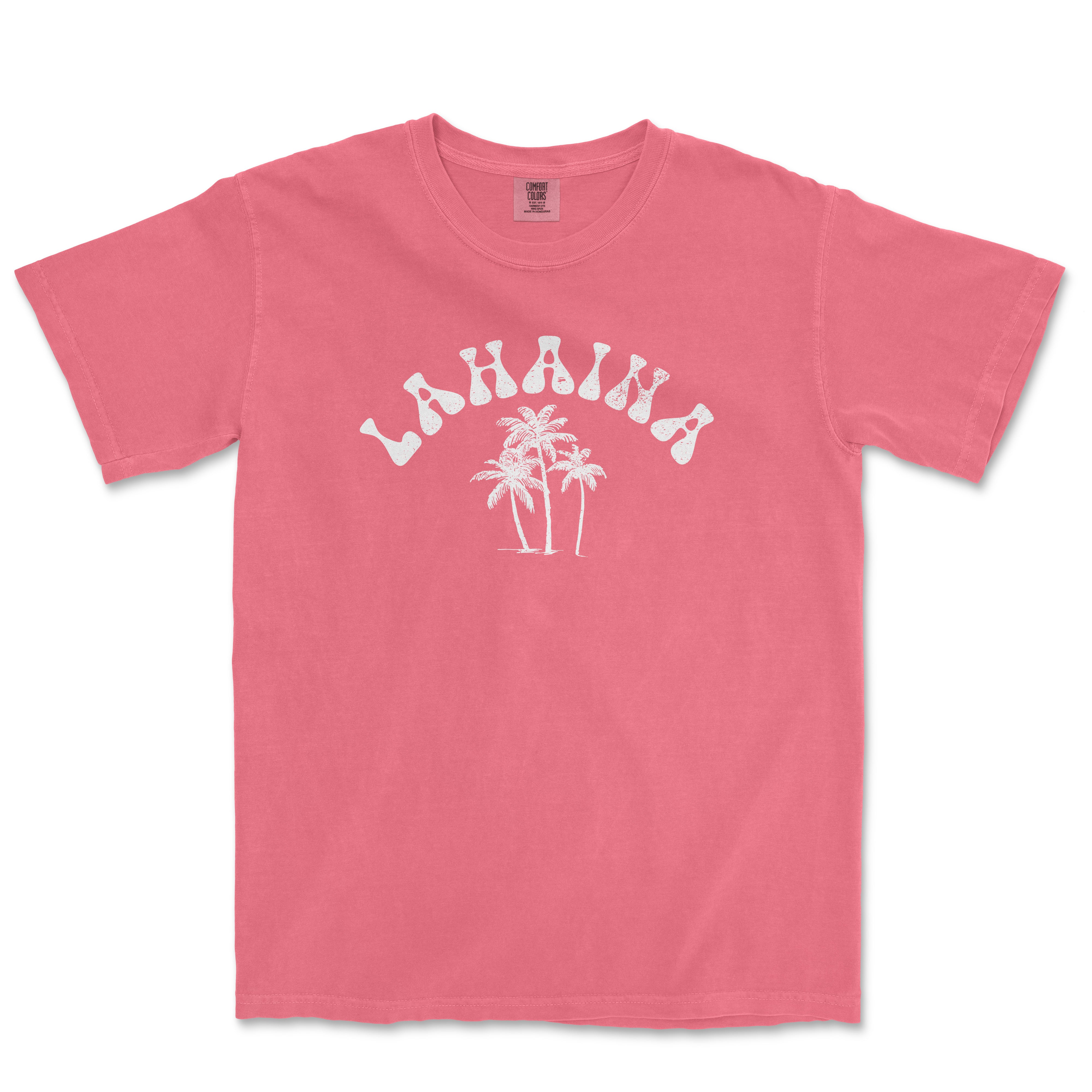 a pink t - shirt with a palm tree on the front