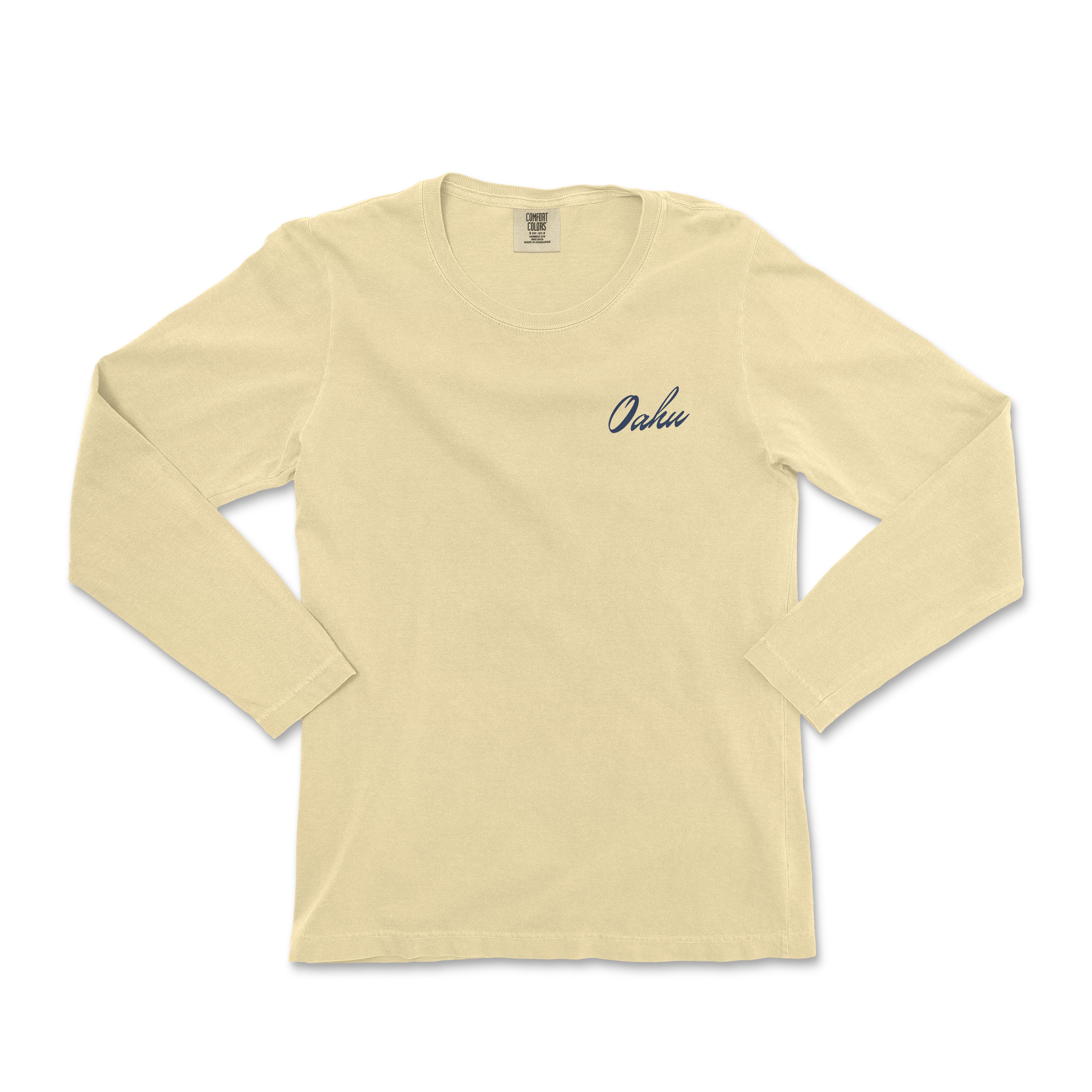 a women's long - sleeved shirt with a small embroidered logo on the