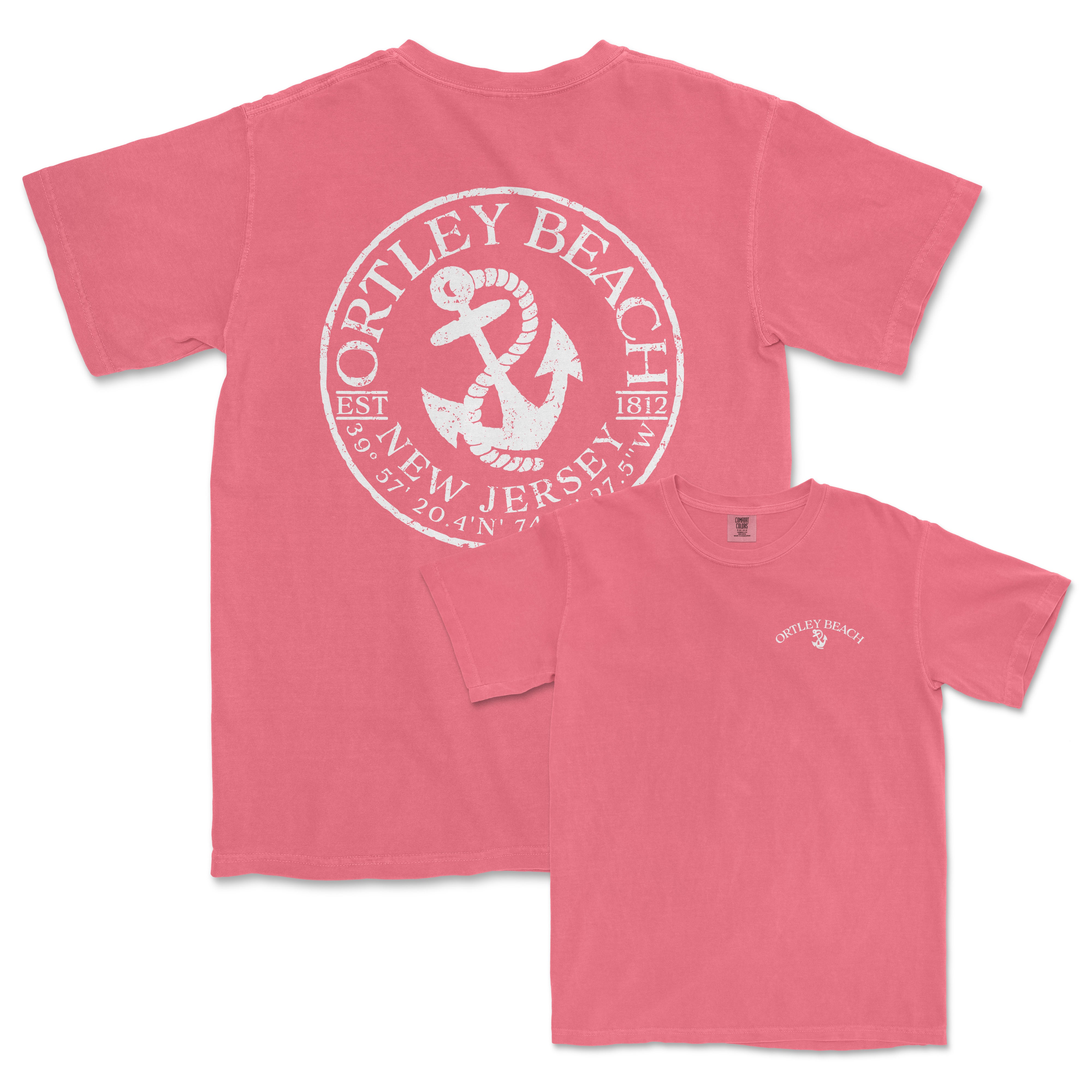 a pink t - shirt with an anchor on it