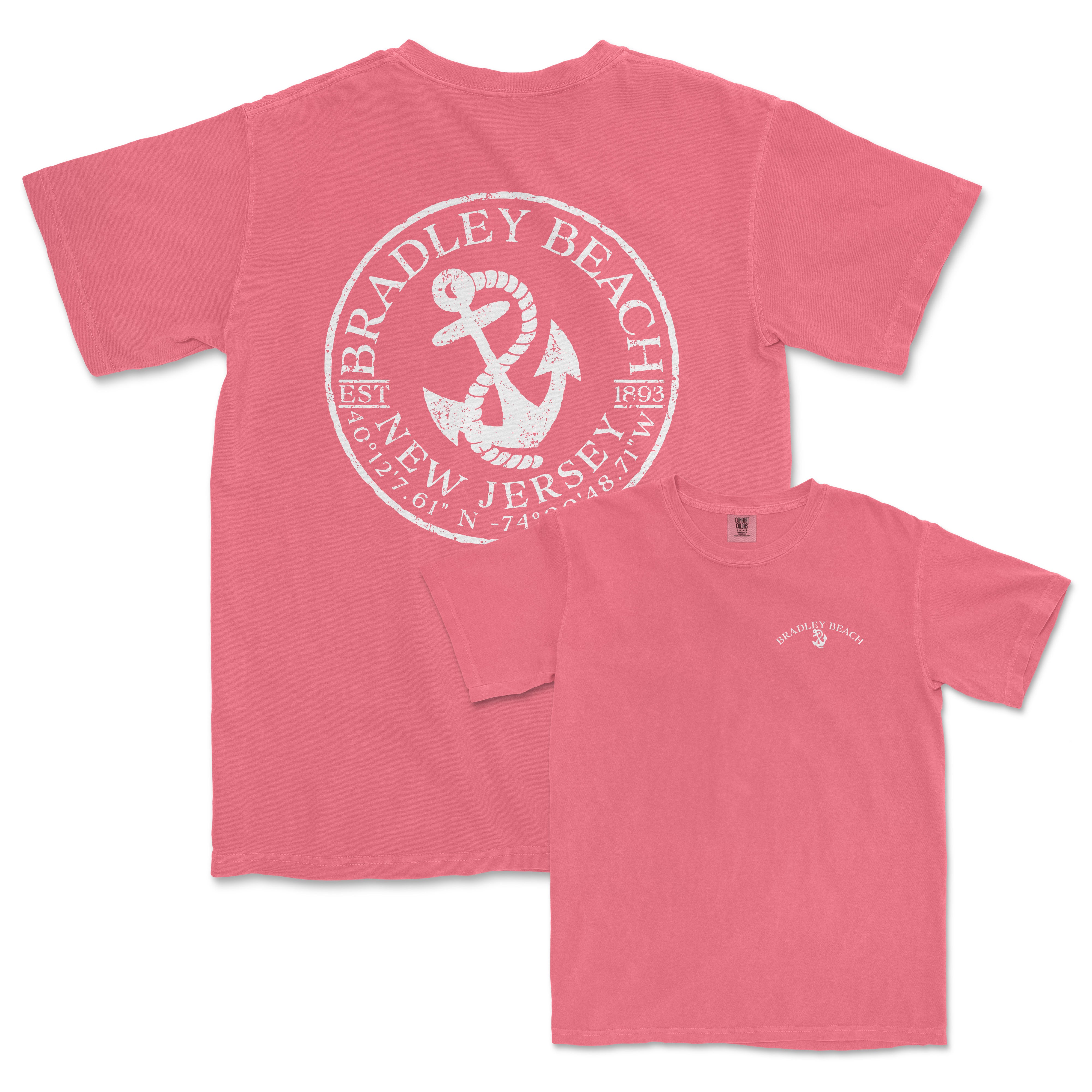 a pink t - shirt with a white anchor on it