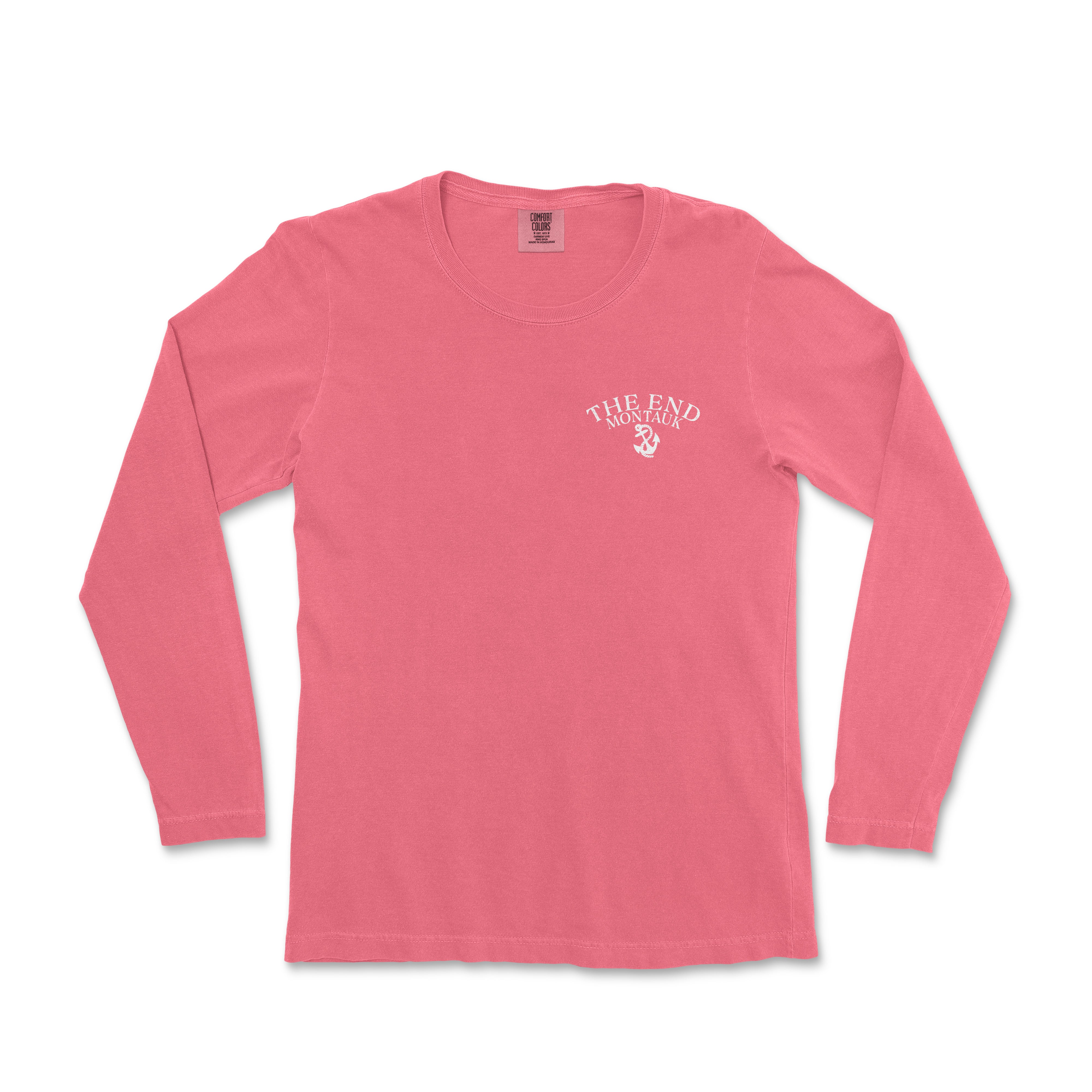 a women's pink long sleeve shirt with a white logo on the chest