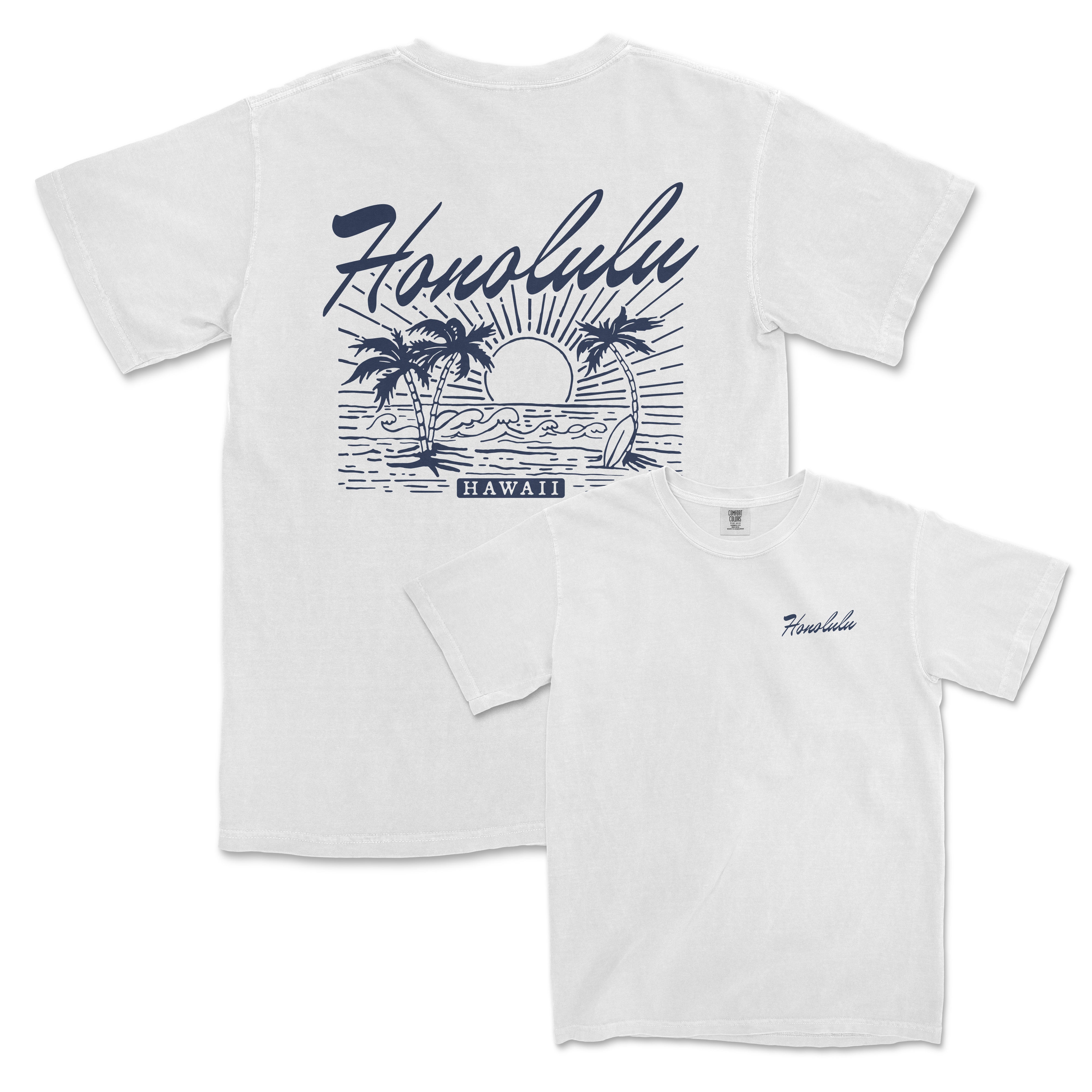 a white t - shirt with an image of a sunset and palm trees